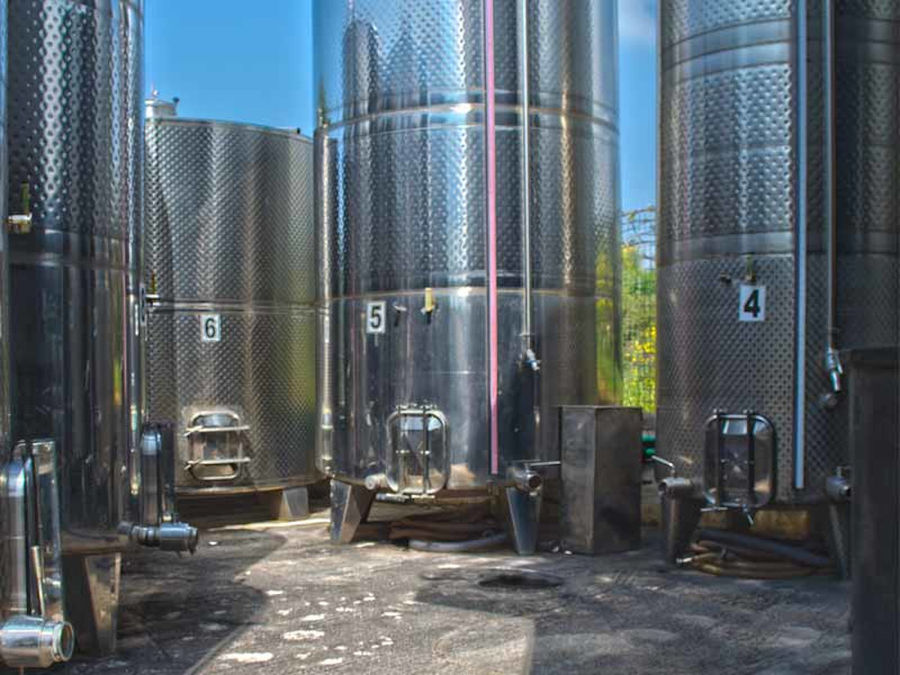 outside aluminum storage tanks at 'Dionysia Kelaria' plant